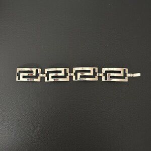 Silvertone Greek key design link bracelet